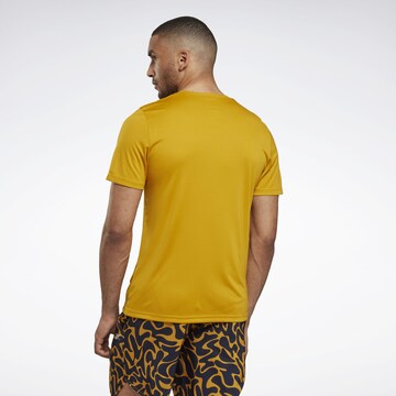 Reebok - Camisa funcionais em amarelo