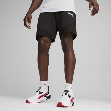 PUMA Regular Sports trousers 'Evostripe' in Black: front