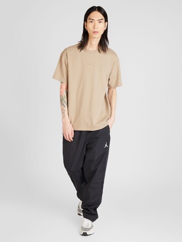Maglietta 'Premium Essentials' di Nike Sportswear in beige
