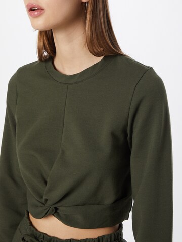 Sweat-shirt 'Shari' ABOUT YOU en vert