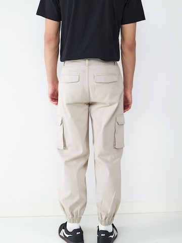 BALMOHK Tapered Gargohousut värissä beige