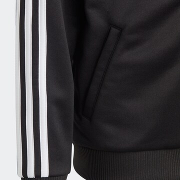 ADIDAS SPORTSWEAR Αθλητική ζακέτα φούτερ 'Essentials' σε μαύρο