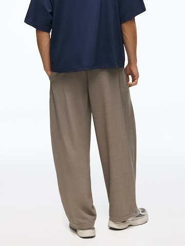 Bershka Baggy Pleat-Front Pants in Beige