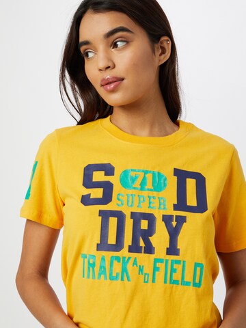 T-shirt 'Collegiate Athletic Union' Superdry en jaune