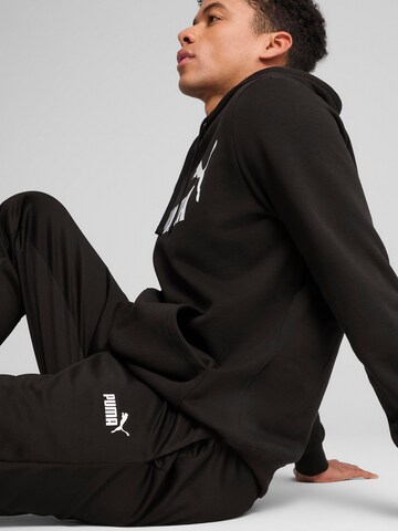 PUMA Конический (Tapered) Спортивные штаны 'Ess No. 1' в Черный