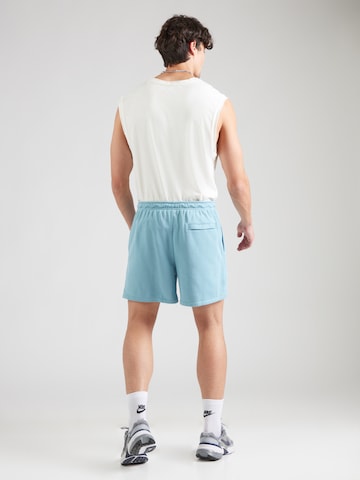 Nike Sportswear Loosefit Kalhoty 'CLUB' – modrá