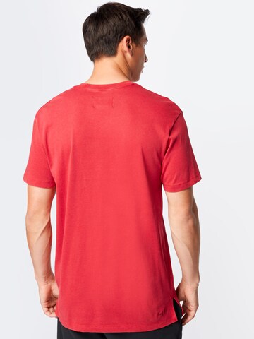 Tricou funcțional de la Jordan pe roșu