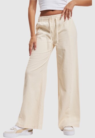 Karl Kani Wide Leg Hose in Beige: predná strana