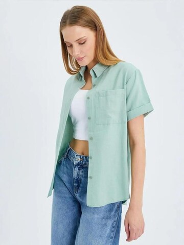 Maglietta di MixRay in verde