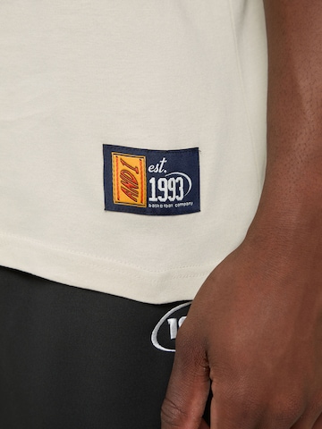 T-Shirt 'Auf Dem Geld' AND1 en gris