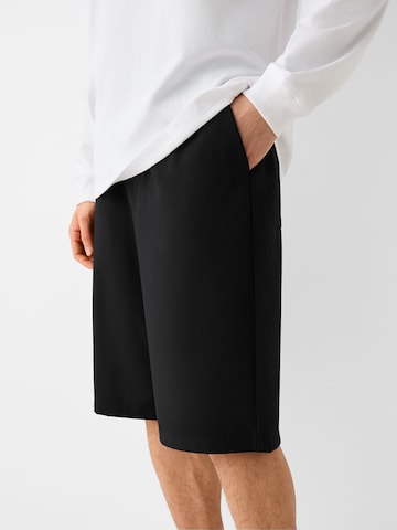 Bershka Loosefit Shorts in Schwarz