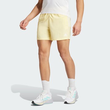 Regular Pantalon de sport 'Own The Run' ADIDAS PERFORMANCE en jaune : devant