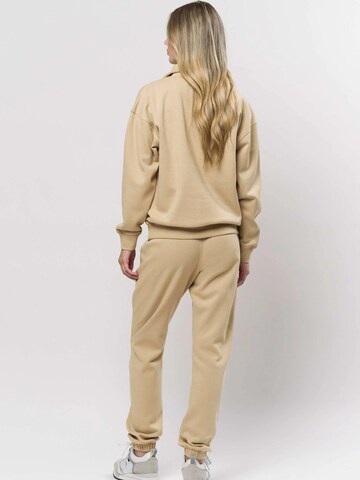 U.S. POLO ASSN. Neulepaita ' Katie ' värissä beige