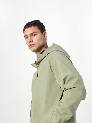 Revolution Between-season jacket in Green