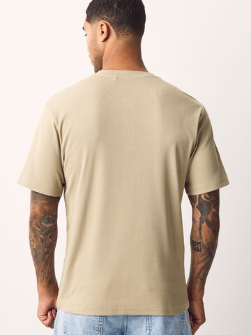 Maglietta di Next in beige