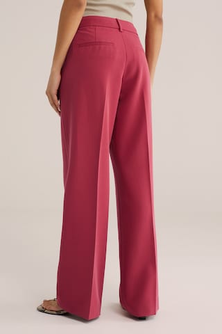 WE FashionWide Leg/ Široke nogavice Hlače - crvena boja