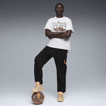 PUMA Performance shirt 'LaFrance Heem' in Grey