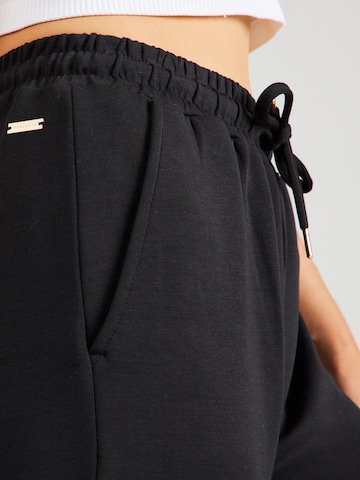 Effilé Pantalon de sport 'Jacey V2' Athlecia en noir