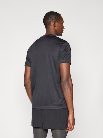 Reebok - Camisa funcionais 'ID TRAIN' em preto