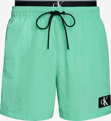 Calvin Klein Swimwear Board Shorts in Green: front