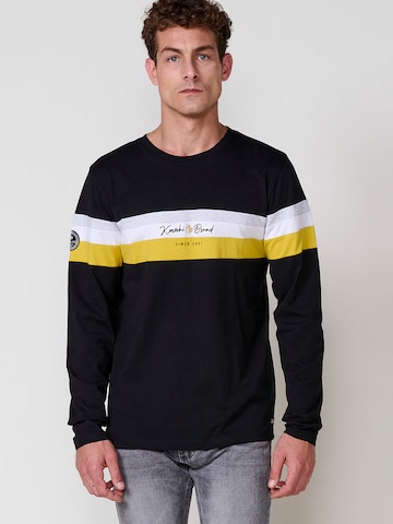 Tricou de la KOROSHI pe negru: față