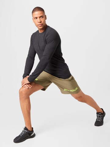 Regular Pantalon de sport UNDER ARMOUR en vert