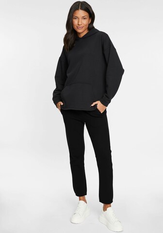 Tamaris Tapered Hose in Schwarz