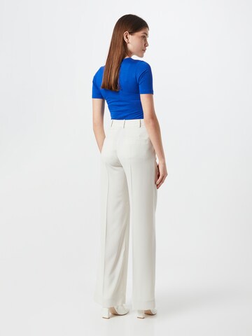 Wide leg Pantaloni con pieghe di Calvin Klein in bianco