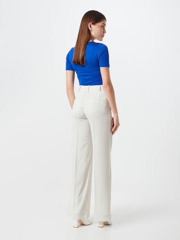 Calvin Klein Zvonové kalhoty Kalhoty se sklady v pase – bílá