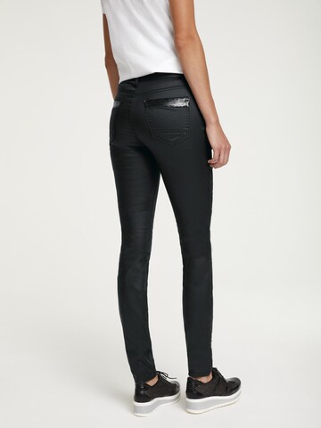 Skinny Jeans de la heine pe negru