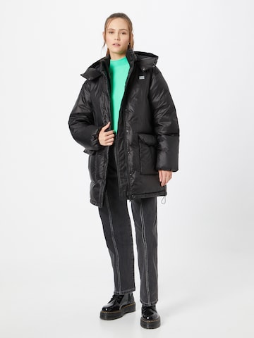 LEVI'S ® Winter Coat 'Luna Core Puffer Mid' in Black