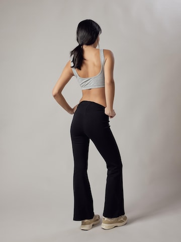 Flared Leggings 'Panta Jazz in Interlock' di OWN Off With Nature in nero