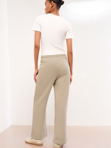 Lipsy Широки крачоли Панталон в бежово