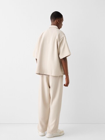 Bershka Loose fit Trousers in Beige