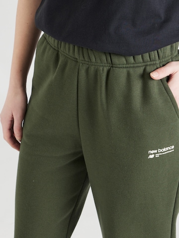 Regular Pantalon 'Heritage' new balance en vert