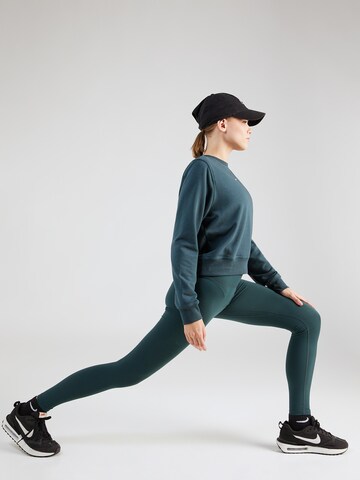 Skinny Pantalon de sport 'ONE' NIKE en vert