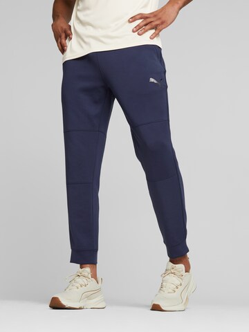 PUMA Tapered Workout Pants in Blue: front