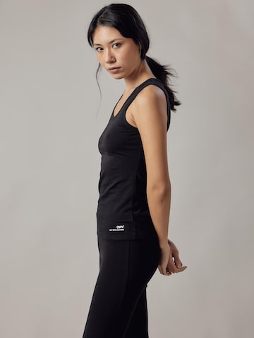 Top 'Canotta' di OWN Off With Nature in nero