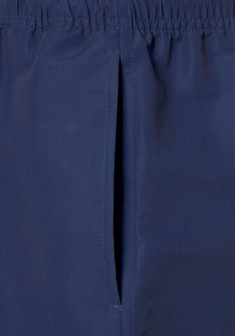 Pantaloncini da bagno di JOHN DEVIN in blu