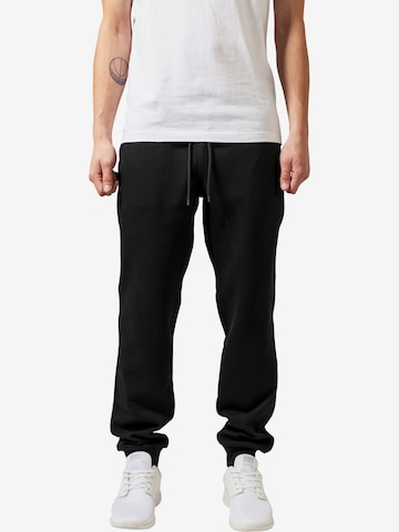 Urban Classics Tapered Pants in Black: front