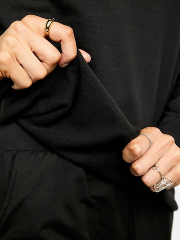 Liberte Essentiel Toppi ' ALMA ' värissä musta