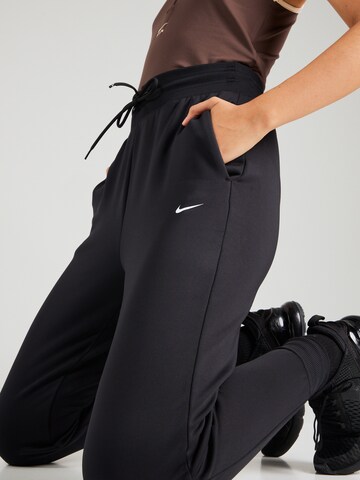 melns NIKE Pakapēniski sašaurināts piegriezums Sporta bikses 'One'