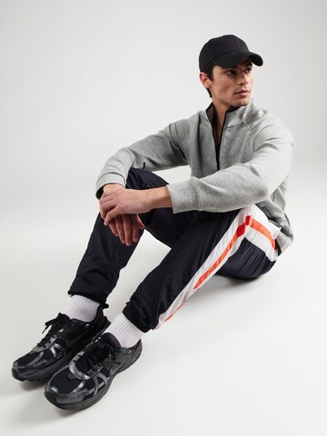 Felpa sportiva 'Unstoppable' di UNDER ARMOUR in grigio