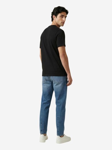 Maglietta 'DM0DM22538' di Tommy Jeans in nero