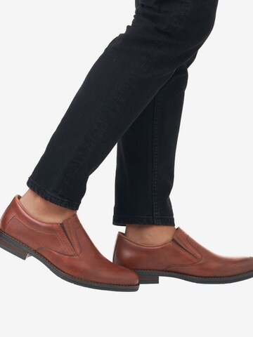 Rieker Slip-ons in Brown