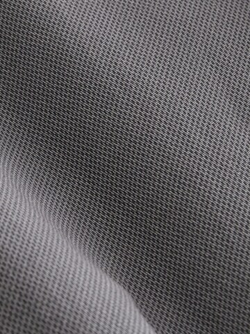 Slimfit Pantaloni chino di Next in grigio