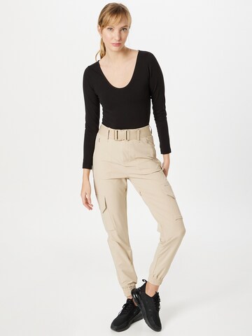 aim'n Tapered Sportbroek in Beige