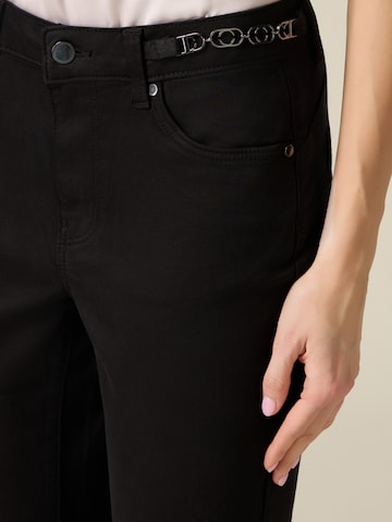 Skinny Pantaloni di oltre in nero