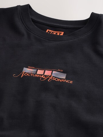 T-Shirt Next en noir