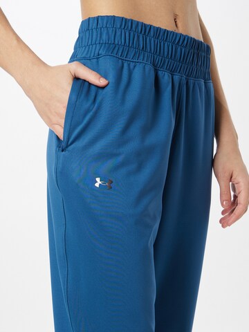 UNDER ARMOUR Tapered Sportbroek 'Meridian' in Blauw